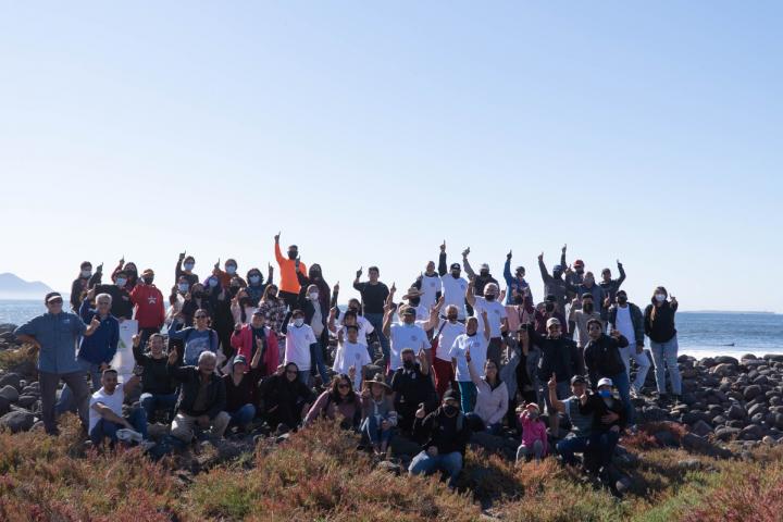 Group of volunteers ready to collect waste at Arroyo San Miguel State Park.